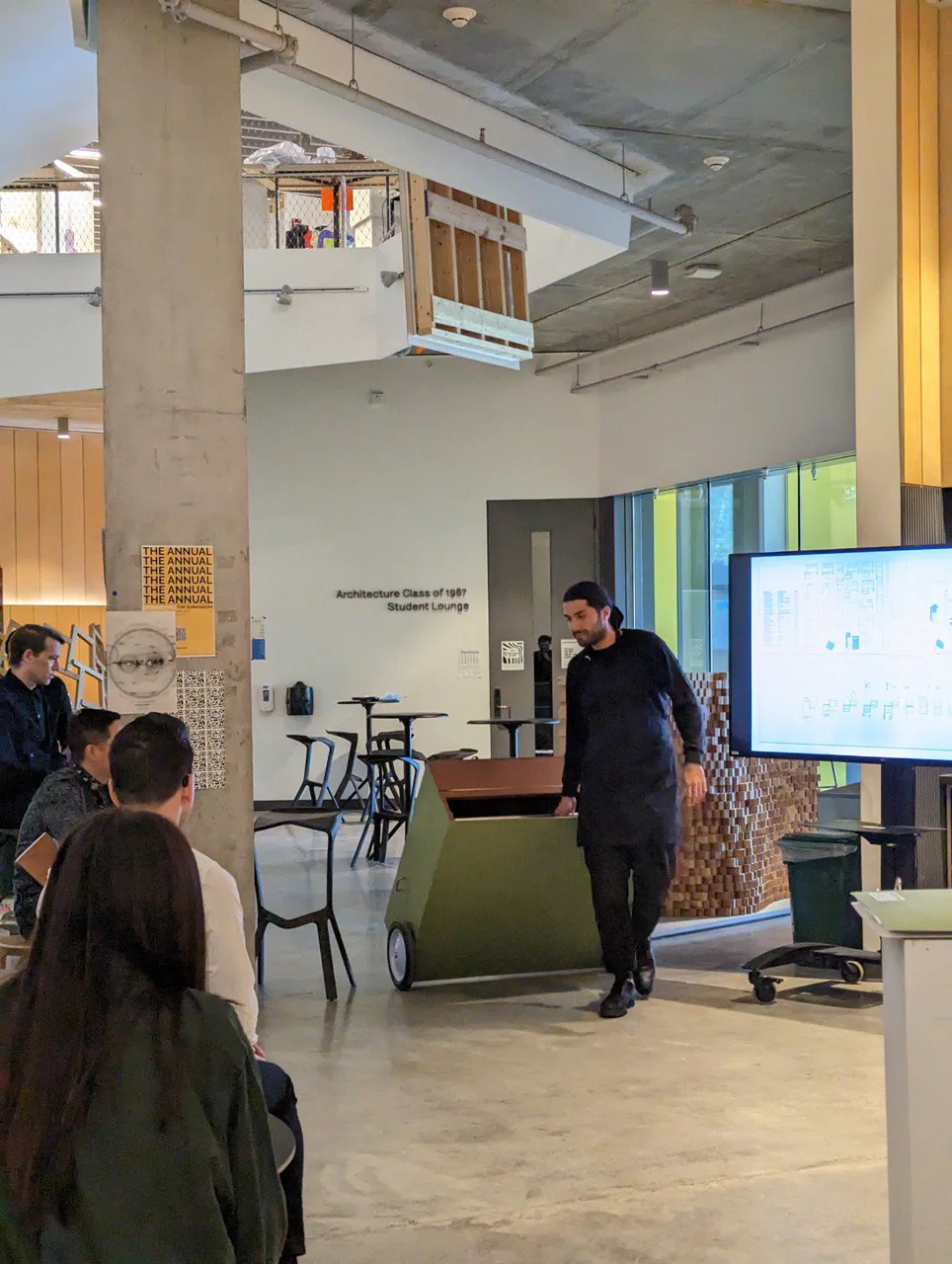 Rolling the green cart in from the side