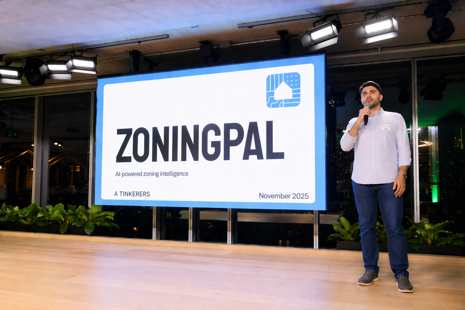 Sam presenting the ZoningPal title slide at AI Tinkerers Toronto